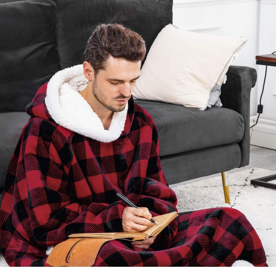 Oversized sherpa hoodie blanket on the couch